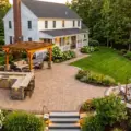 15 Stunning Hardscaping Ideas to Transform Your Massachusetts Backyard in 2026 (Patios, Walls, Fire Pits & More)