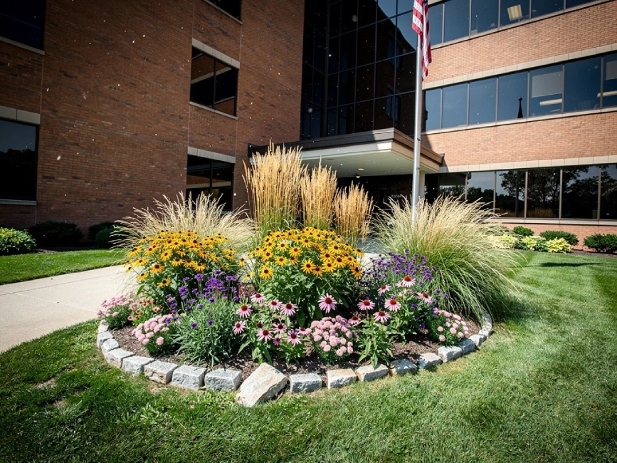 Circular landscape island at MA corporate entrance