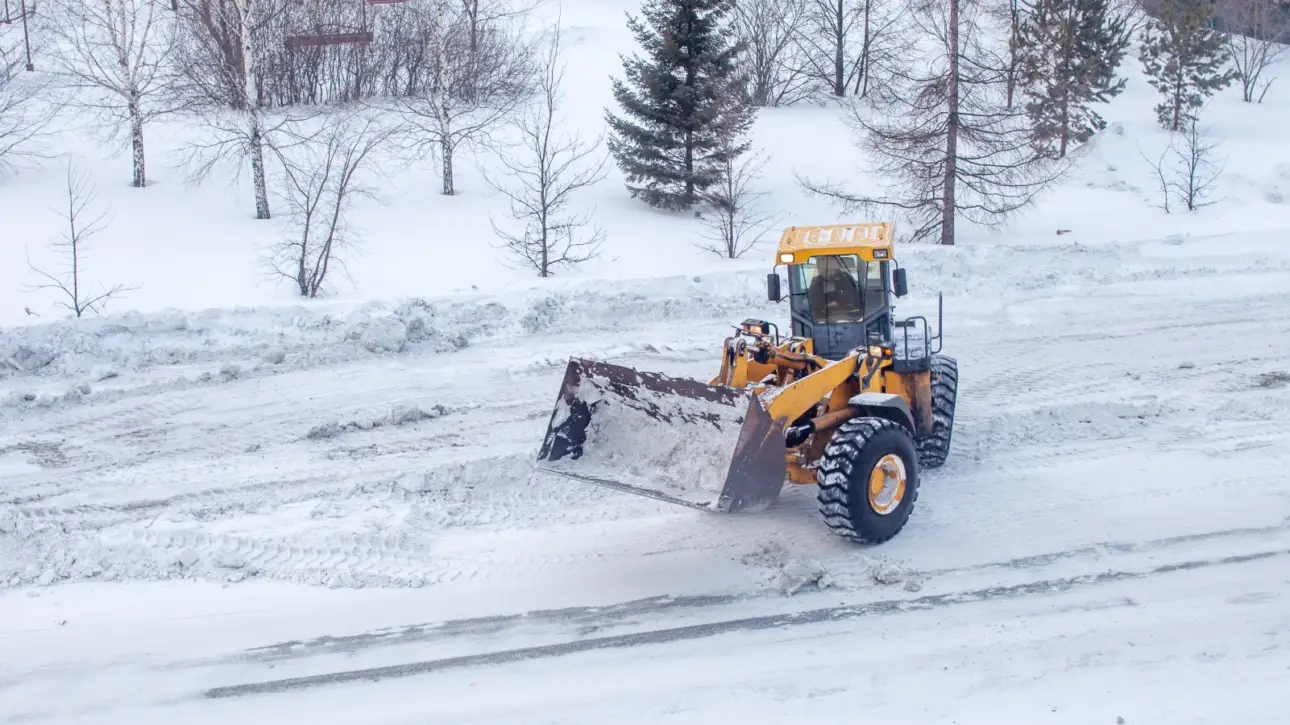 Industrial snow hauling in Lawrence MA commercial lot cleanup