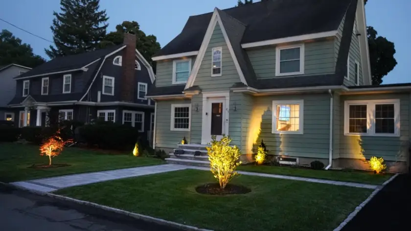 Professional lawn installation Massachusetts front yard landscape lighting colonial home
