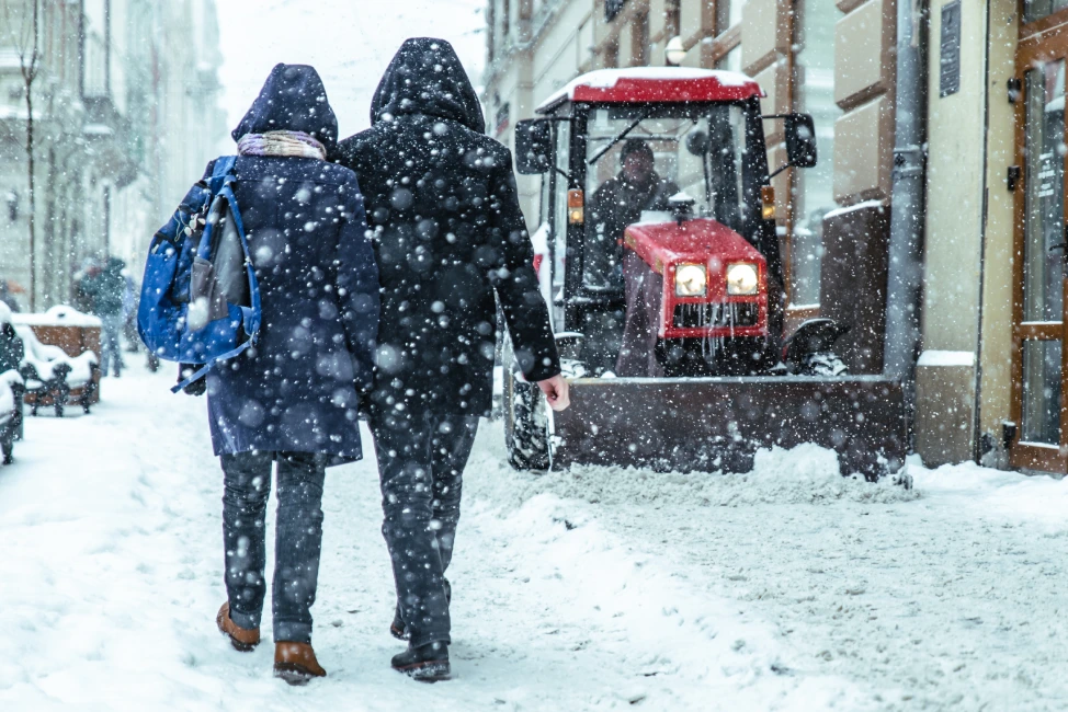 Winter sidewalk snow clearing on Main Street Salem MA downtown
