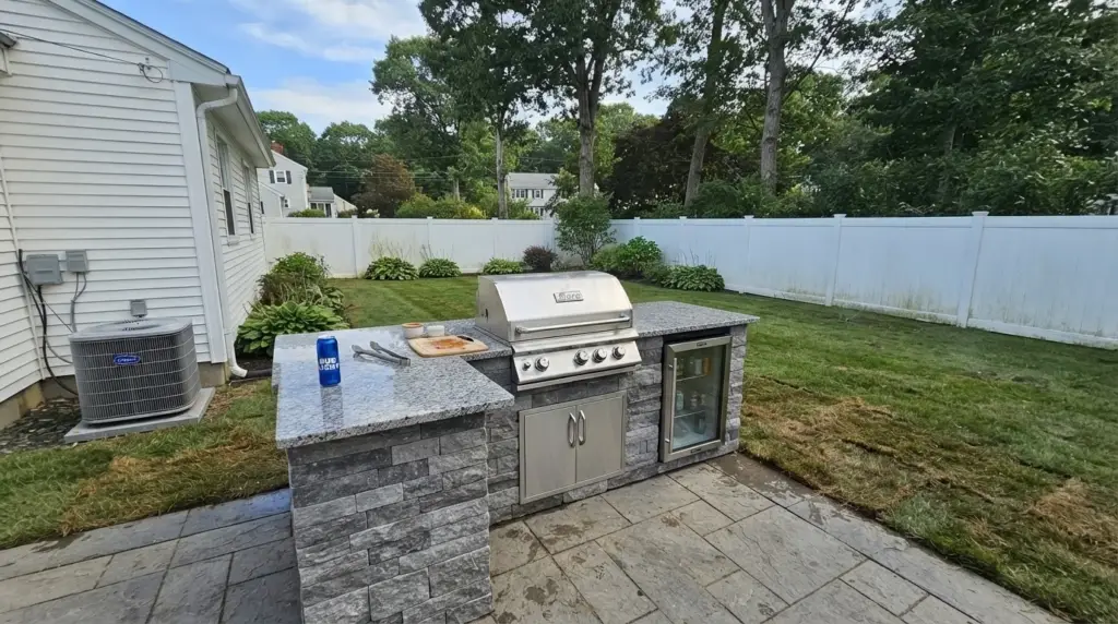 small outdoor kitchen white vinyl fence MA