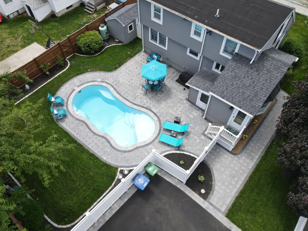 Residential landscape design with pool and patio Massachusetts