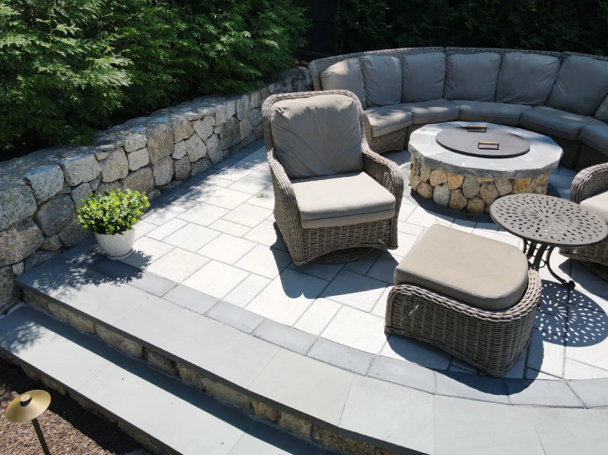 Stone fire pit patio with raised bluestone, MA