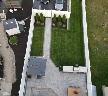 Aerial view of manicured backyard lawn
