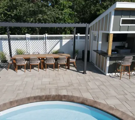 Backyard paver patio with outdoor kitchen and bar Rowley MA