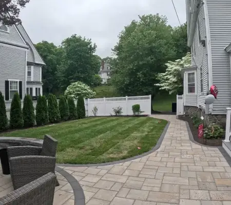 Backyard paver walkway and fire pit landscaping Lexington MA