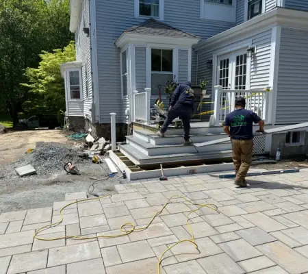 Crew installing composite deck steps