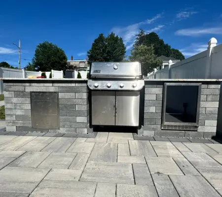 Custom outdoor kitchen with built-in grill