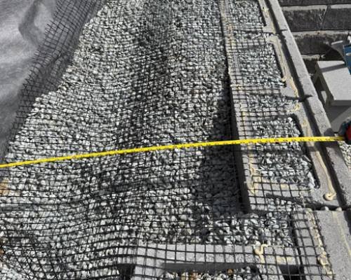 Custom-stone-retaining-wall-installation-Wenham-MA