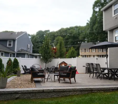 Gravel garden walkway with stone steps and retaining walls Georgetown MA