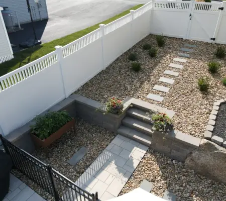 Gravel garden walkway with stone steps and retaining walls Swampscott MA