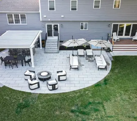 Marblehead MA Luxury backyard paver patio with pergola, fire pit and deck