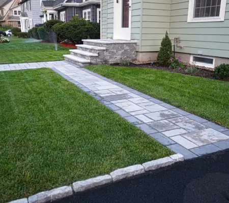 Massachusetts sod installation front yard paver walkway granite steps colonial