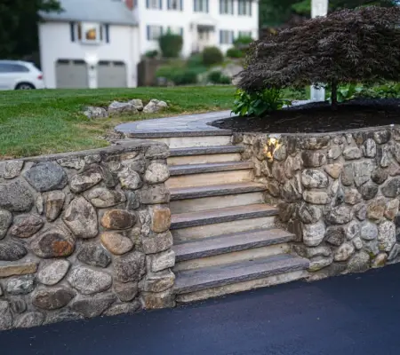 Native plant landscaping in Newburyport, Massachusetts - retaining wall
