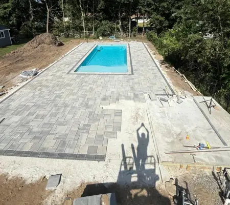 Pool installation with stone surround