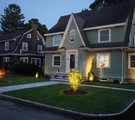Professional lawn installation Massachusetts front yard landscape lighting colonial home